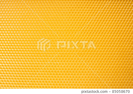 texture of yellow honeycomb close-up 85058670