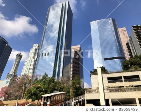 Angels Flight in downtown Los Angeles with buildings and blue sky in the background 85059459