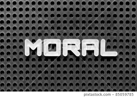 White alphabet letter in word moral on black pegboard background 85059785