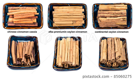 set of various cinnamon in bowls with names 85060275