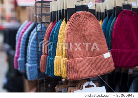 Closeup of woolen hats for sale at the market Closeup of woolen hats for sale at the market 85060942