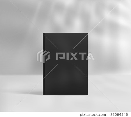 Black book with sun flare effect. Light of the window with reflections on the wall and on the floor Black book with sun flare effect. Light of the window with reflections on the wall and on the floor 85064346