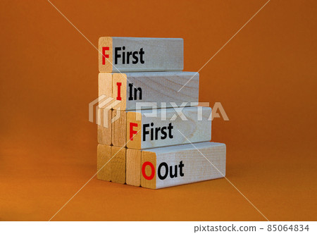 FIFO first in first out symbol. Concept words FIFO first in first out on wooden blocks. Beautiful orange table, orange background. Business and FIFO first in and out concept. Copy space. FIFO first in first out symbol. Concept words FIFO first in first out on wooden blocks. Beautiful orange table, orange background. Business and FIFO first in and out concept. Copy space. 85064834