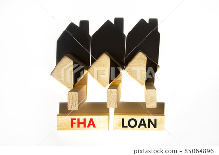FHA federal housing administration loan symbol. Concept words 'FHA federal housing administration loan' on wooden blocks on a beautiful white background. Business and FHA loan concept. Copy space. FHA federal housing administration loan symbol. Concept words 'FHA federal housing administration loan' on wooden blocks on a beautiful white background. Business and FHA loan concept. Copy space. 85064896
