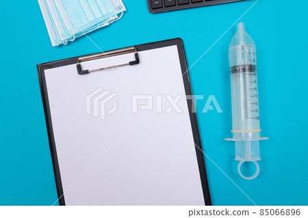 Anti Vaccination Concept - Syringe in a Condom Anti Vaccination Concept - Syringe in a Condom 85066896