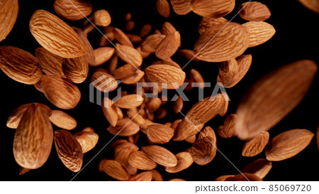 Freeze motion of flying whole almonds. Freeze motion of flying whole almonds. 85069720