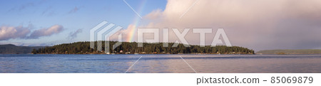 Double Rainbow in the cloudy sky over the pacific ocean and Gulf Islands Double Rainbow in the cloudy sky over the pacific ocean and Gulf Islands 85069879