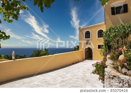 Monastery Mirtiotissas on the western Corfu island coast, Greece. Monastery Mirtiotissas on the western Corfu island coast, Greece. 85070416