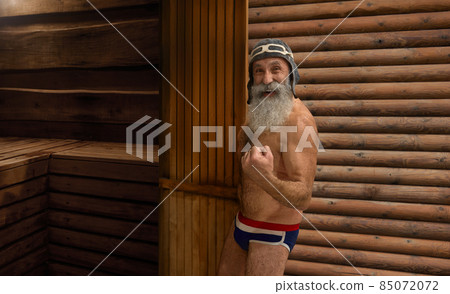 Old senior man enjoy bathhouse clenching fist 85072072