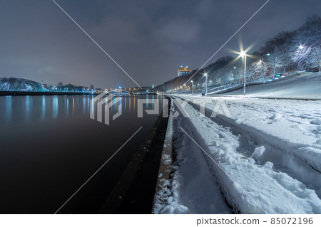 View of the Moskva River embankment at night in winter.  85072196