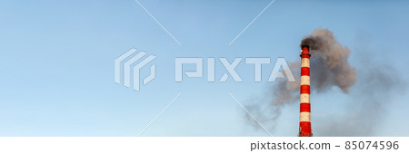 Banner. White thick smoke from the boiler room chimney. Smoke against the blue sky. Air pollution. Heating of the city. Industrial zone. Banner. White thick smoke from the boiler room chimney. Smoke against the blue sky. Air pollution. Heating of the city. Industrial zone. 85074596