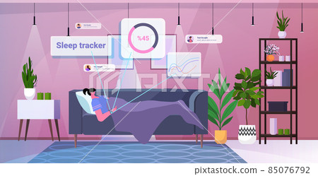 tired woman sleeping with electronic smart watch app tracker on hand quality and quantity sleep control concept 85076792