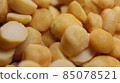 Yellow chickpea lentils seeds macro closeup view 85078521