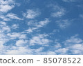 white fluffy clouds on blue sky in summer 85078522