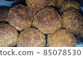 Closeup view of fried pizza bombs or pizza balls are altered form of pizza. 85078530