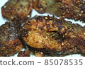 Spicy and crunchy barbecue of fried fish fillet on a white background 85078535