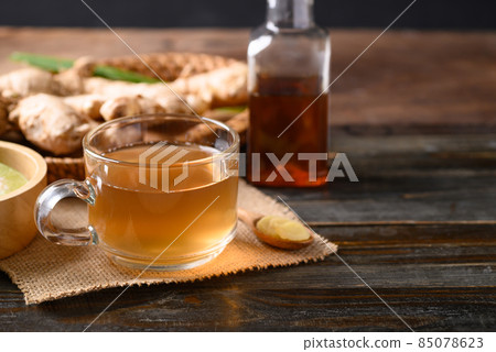 Ginger tea with lime and honey on wooden background, Healthy herbal drink Ginger tea with lime and honey on wooden background, Healthy herbal drink 85078623