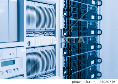 Cluster of data storage hard drives inside server room 85080716