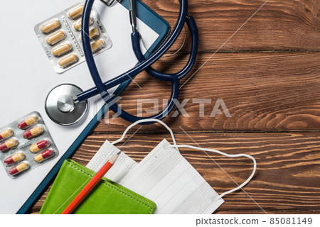 Desk of doctor with medicine things 85081149