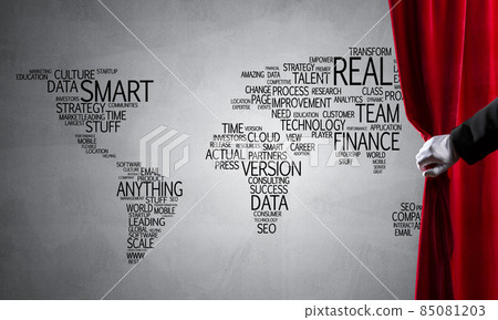 World map behind drapery curtain and hand opening it 85081203