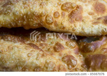 macro photography of fried pastries, bread, pie, macro texture of a bread product macro photography of fried pastries, bread, pie, macro texture of a bread product 85087076