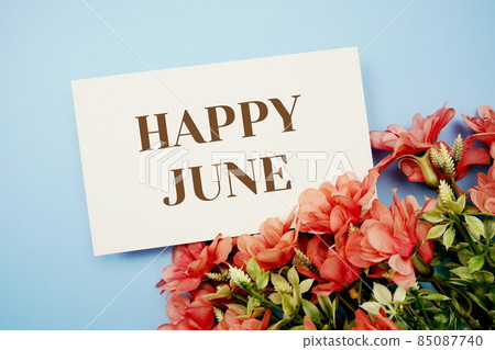 Happy Junetext with flower frame on blue background 85087740