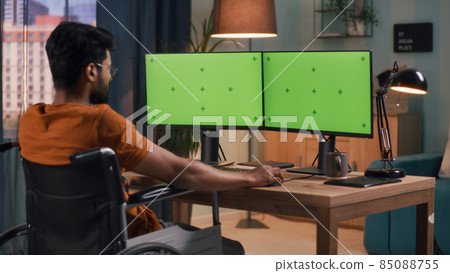 Man with disability using computer 85088755