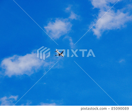 Blue sky clouds airplane Blue sky clouds airplane 85090089