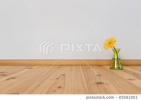 Yellow gerbera flower in a green flower vase 85091001