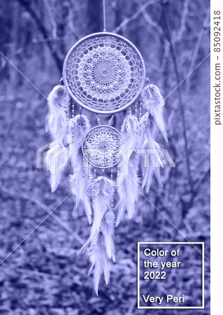 Handmade dream catcher with feathers threads and beads rope in very peri trendy color of the year 2022. 85092418