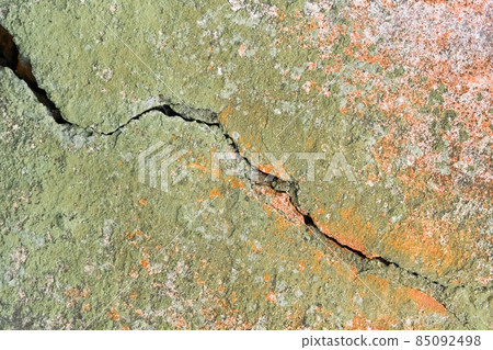 Crack on old, weathered, dirty, green with mold broken wall texture background Crack on old, weathered, dirty, green with mold broken wall texture background 85092498