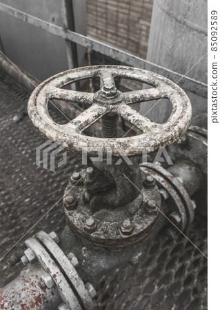 Old valve for opening or shutting down pipeline for fuel oil chemical tanks in an abandoned industrial plant 85092589