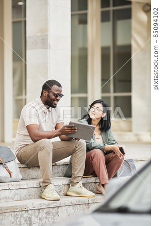 People on Steps in City 85094102
