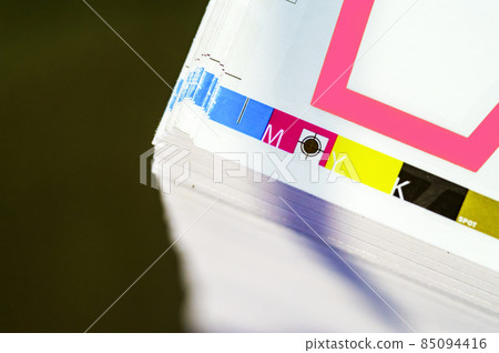 Sheets of printed products. Offset printing. CMYK press. Paper at the printing house. 85094416