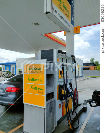 SELANGOR, MALAYSIA -MARCH 05, 2021: Shell petrol station and fuel pump dispenser. Shell provided self-service dispenser with a self-service payment method to avoid human interaction. SELANGOR, MALAYSIA -MARCH 05, 2021: Shell petrol station and fuel pump dispenser. Shell provided self-service dispenser with a self-service payment method to avoid human interaction. 85096236