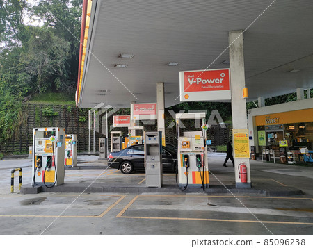 SELANGOR, MALAYSIA -MARCH 05, 2021: Shell petrol station and fuel pump dispenser. Shell provided self-service dispenser with a self-service payment method to avoid human interaction. 85096238