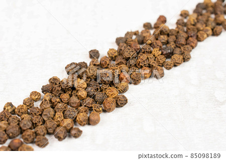Spicy black pepper on white 85098189