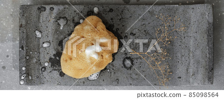 Organic sea sponge with soap foam on grey concrete tray. Bathroom accessories in contemporary bathroom interior. Daily body care, spa and wellness zero waste bathroom concept Organic sea sponge with soap foam on grey concrete tray. Bathroom accessories in contemporary bathroom interior. Daily body care, spa and wellness zero waste bathroom concept 85098564