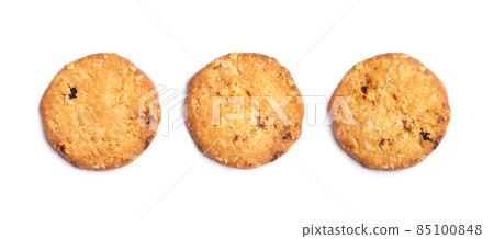 Three vanilla chip butter cookies isolated on white background. Close-up view of brown crackers. Macro shot of yellow biscuit cake leftovers for your design 85100848