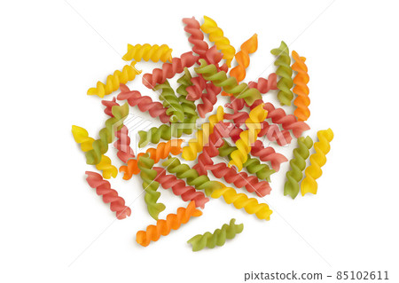 raw Fusilli colored pasta, isolated on white background with clipping path and full depth of field. Top view. Flat lay raw Fusilli colored pasta, isolated on white background with clipping path and full depth of field. Top view. Flat lay 85102611