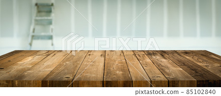 Empty Wood Table Surface Display Background with Construction Theme Behind. Empty Wood Table Surface Display Background with Construction Theme Behind. 85102840