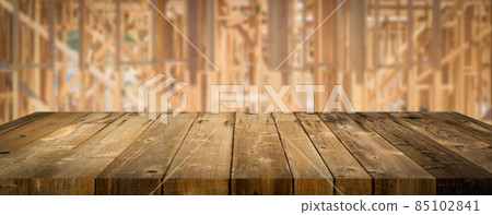 Empty Wood Table Surface Display Background with Construction Theme Behind. Empty Wood Table Surface Display Background with Construction Theme Behind. 85102841