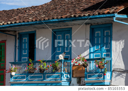 Beautiful balcony and facade of a house at the small town of Salento located at the region of Quindio in Colombia 85103353