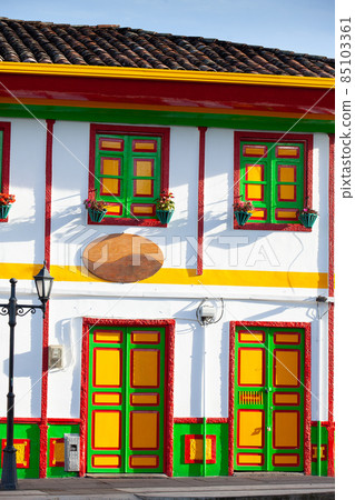 Beautiful street and facades of the houses of the small town of Salento located at the region of Quindio in Colombia 85103361