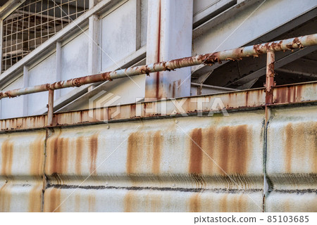 Public bicycle parking lot Red rust on the outside 85103685