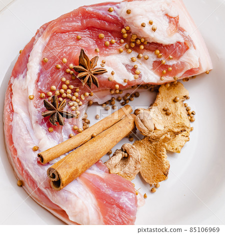Raw pork belly, garnished with spices, ready to cook beautiful meat can cook many things 85106969