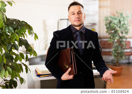 Young businessman meeting partners at office Young businessman meeting partners at office 85108924