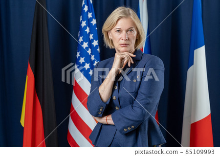 Contemporary mature female delegate in formalwear 85109993