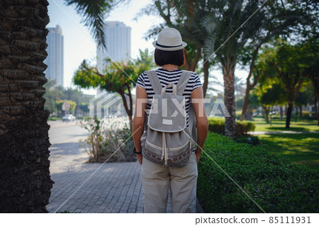 young stylish hipster Asia woman walking on the street 85111931