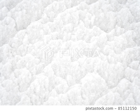 The white texture of the snow is rough and loose. Full screen photo The white texture of the snow is rough and loose. Full screen photo 85112150